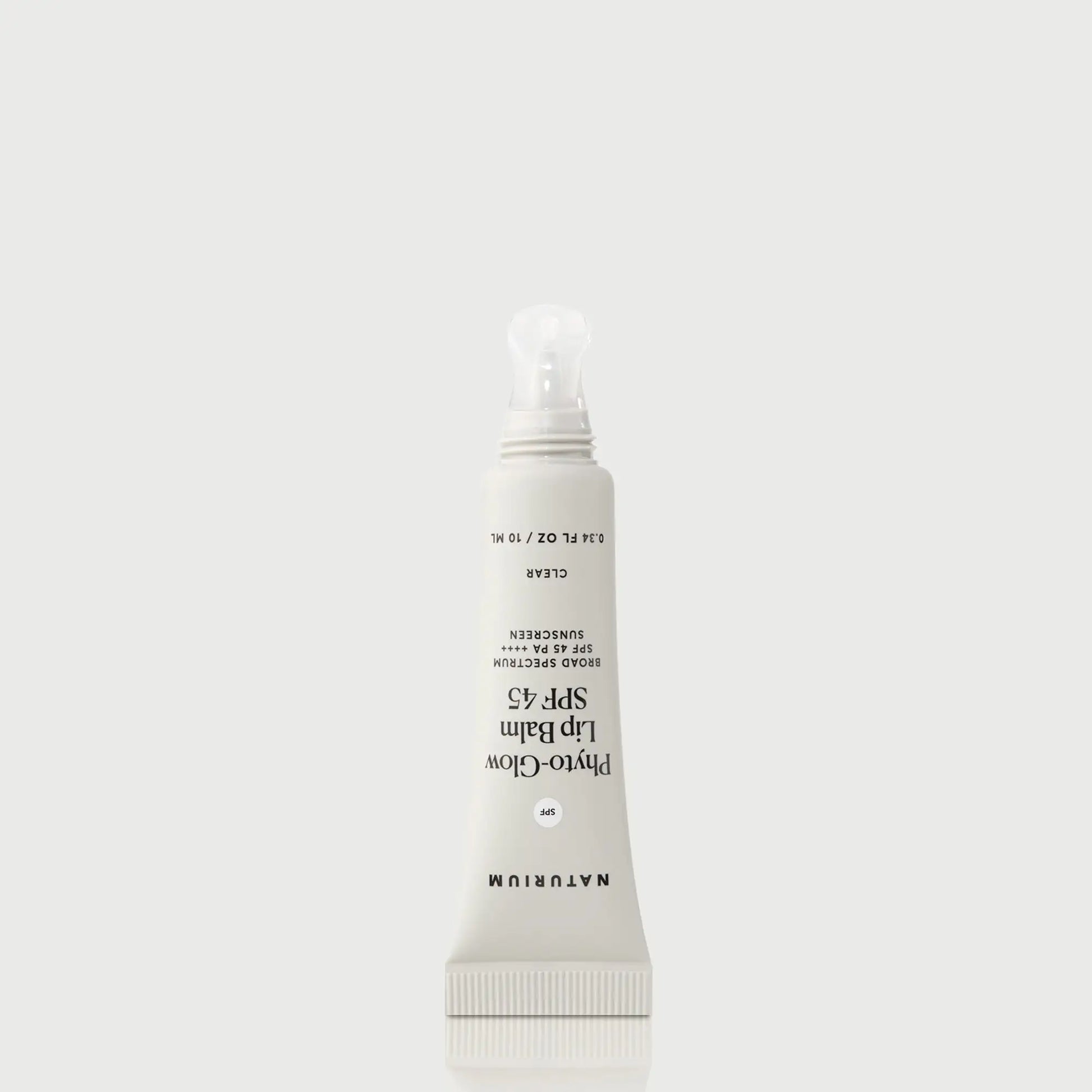 phyto-glow-lip-balm-spf-45-clear-z7 NATR-10124_PhytoGlow_SPF_Clear_primary_nocap_bonebkgd_1.webp