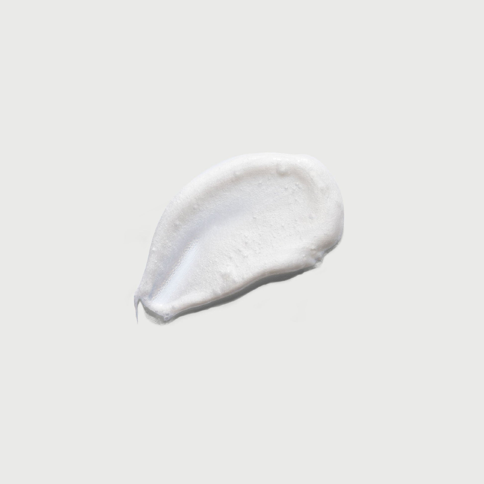 the-smoother-glycolic-acid-exfoliating-body-wash-n6 NATR-40002-Swatch-The-Smoother-Glycolic-Acid-Exfoliating-Body-Wash-bonebkgd.jpg