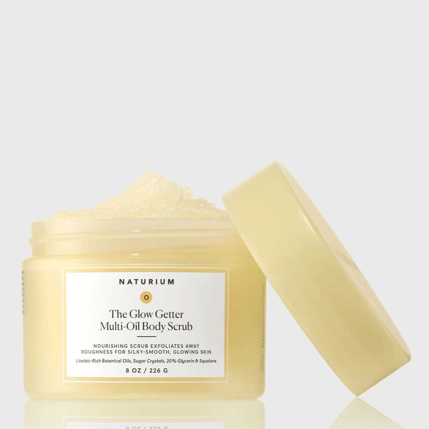 the-glow-getter-multi-oil-body-scrub-r7 NATR-40028-GlowGetter-Multi-Oil-Body-Scrub-Front-CapOff-bonebkgd.webp