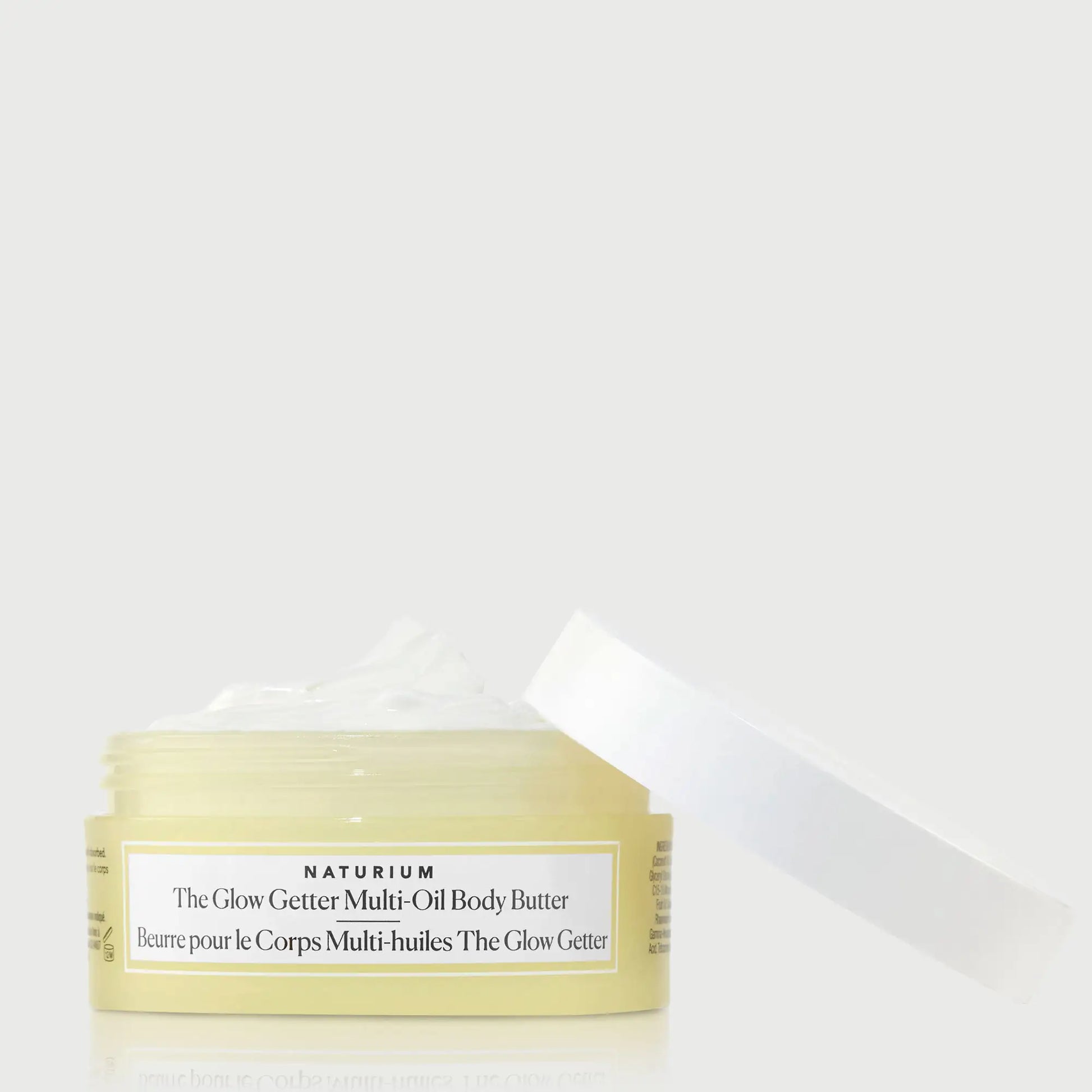 the-glow-getter-multi-oil-body-butter-travel-size-x9 NATR-40115_Glow-Getter-Body-Butter-Mini_front_capoff_bonebkgd.webp